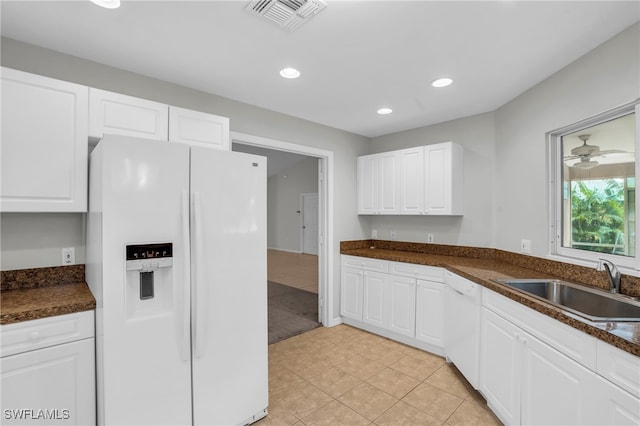 kitchen with white cabinetry, white appliances, light tile patterned floors, sink, and ceiling fan