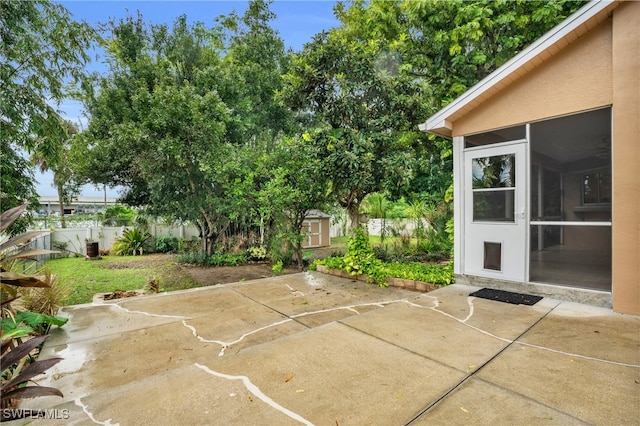 view of patio / terrace with a sunroom