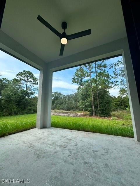 3706 E 19th St, Lehigh Acres, FL 33972 - unfurnished sunroom with a ceiling fan