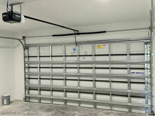 garage featuring a garage door opener