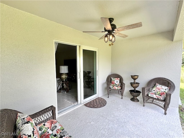 view of patio / terrace featuring a ceiling fan