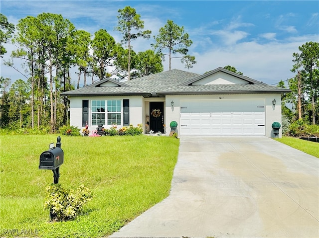 single story home with a front lawn and a garage