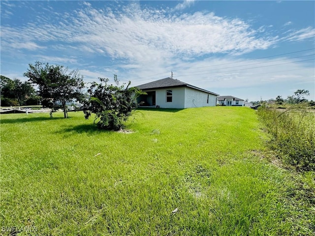 3214 68th St W, Lehigh Acres, FL 33971 - view of grassy yard