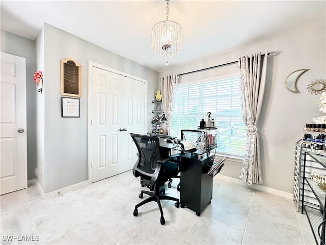 home office featuring light tile patterned floors, baseboards, and a chandelier