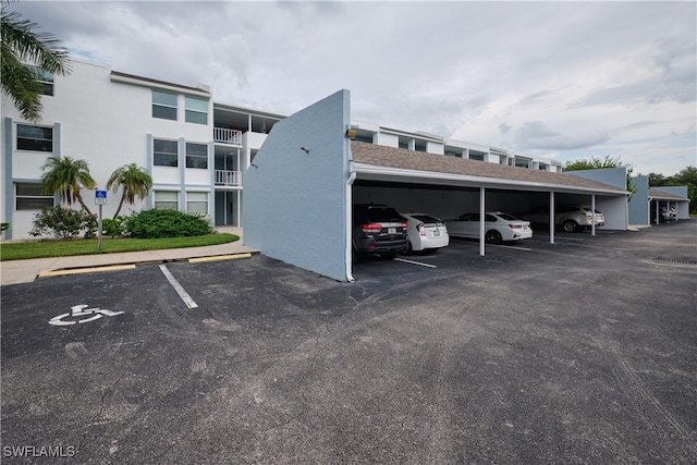 exterior space featuring a carport