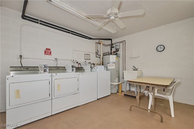 laundry area featuring ceiling fan, water heater, and washer and dryer