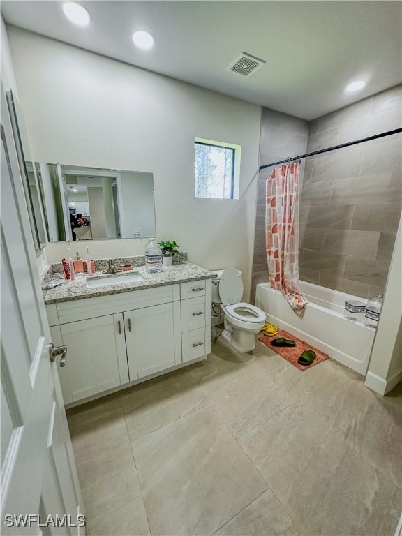 full bathroom featuring shower / tub combo, tile patterned floors, vanity, and toilet