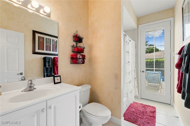 bathroom with vanity, tile patterned flooring, toilet, and a shower with shower curtain