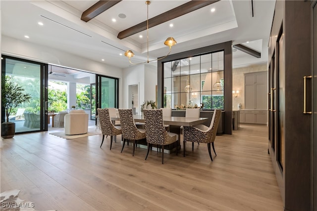 dining space with light wood-type flooring, a wealth of natural light, and beamed ceiling