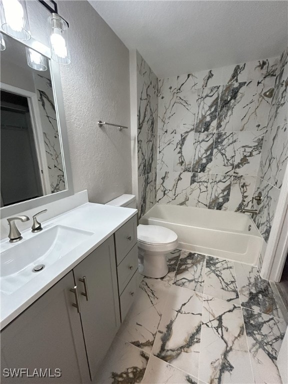 full bathroom with toilet, a textured ceiling, shower / washtub combination, and vanity