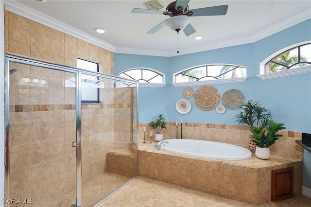 bathroom with plus walk in shower, ceiling fan, crown molding, and tile patterned flooring