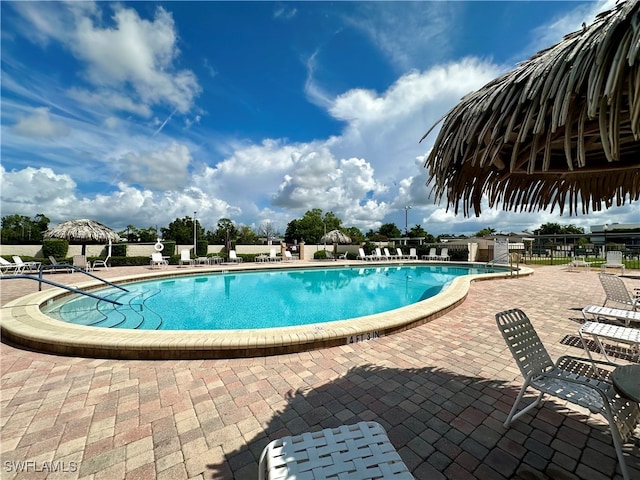 view of pool featuring a patio and a gazebo