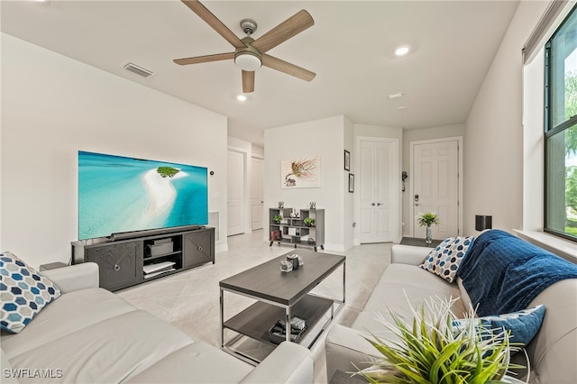 living room featuring ceiling fan