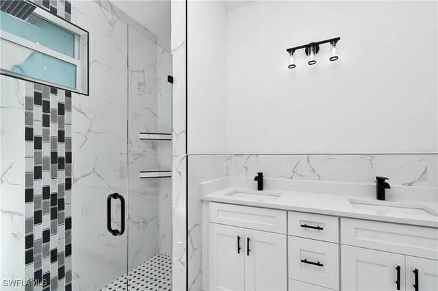 bathroom featuring vanity, tile walls, and walk in shower