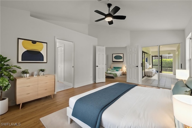 bedroom with lofted ceiling, ceiling fan, hardwood / wood-style floors, and access to outside