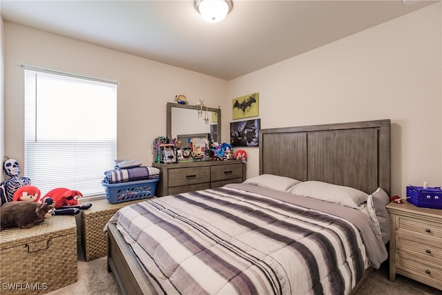 bedroom with light colored carpet