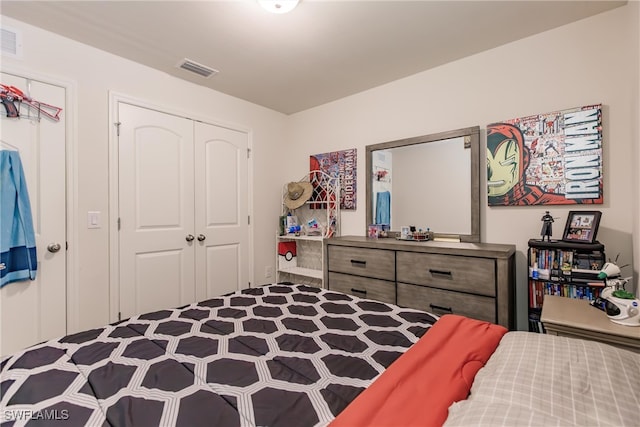 bedroom with a closet and carpet flooring