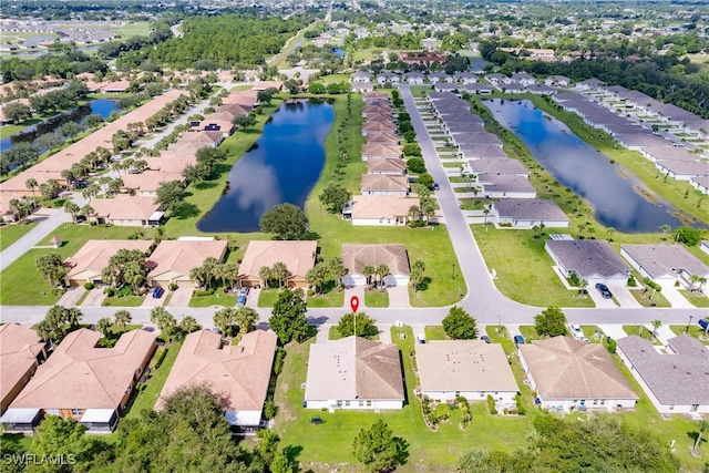 drone / aerial view featuring a water view