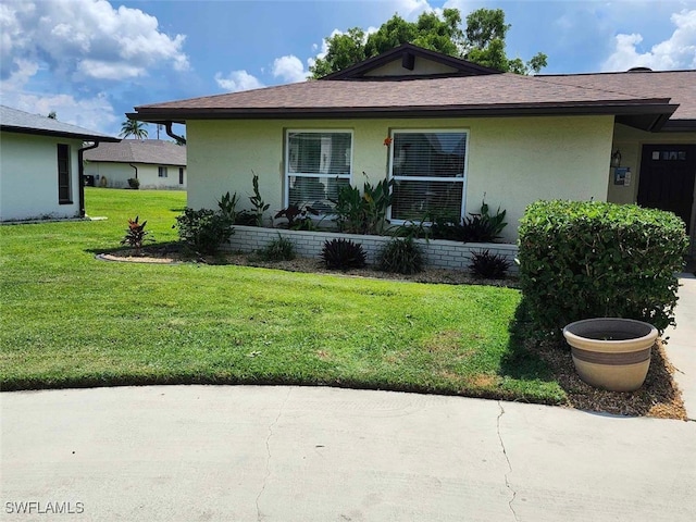 view of front of house with a front yard