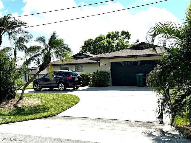 ranch-style house featuring a garage