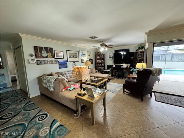 tiled living room with ceiling fan and ornamental molding