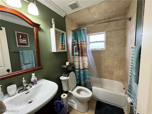 full bathroom with tile patterned flooring, sink, toilet, crown molding, and shower / bath combo