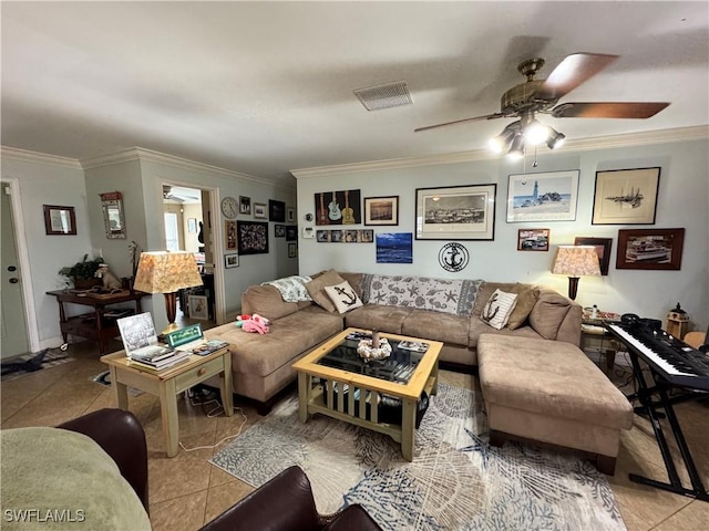 tiled living room featuring ceiling fan and ornamental molding