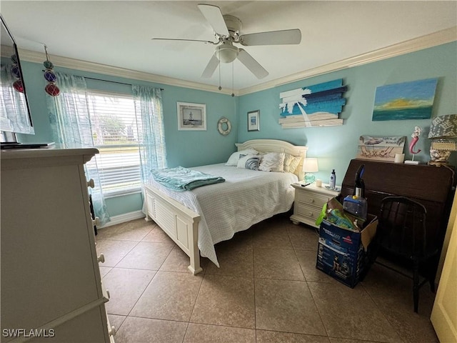 bedroom featuring ceiling fan, tile patterned floors, and ornamental molding