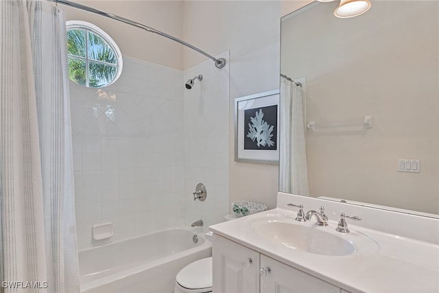 full bathroom featuring shower / bathtub combination with curtain, vanity, and toilet