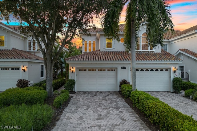 view of front of home with a garage