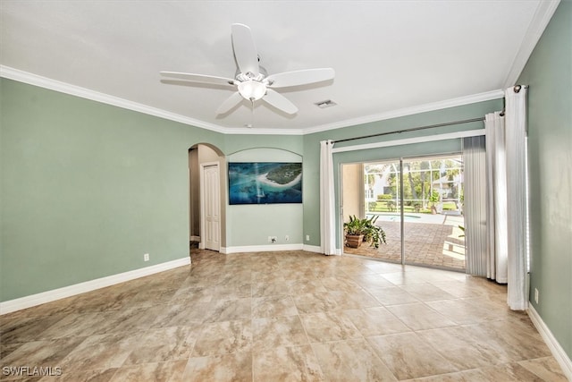 spare room with crown molding and ceiling fan