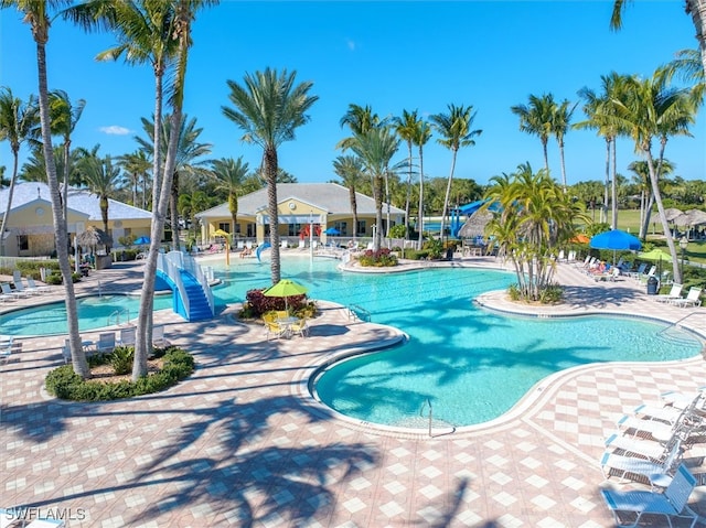 view of swimming pool with a patio