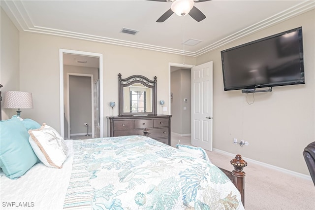 carpeted bedroom featuring ornamental molding and ceiling fan