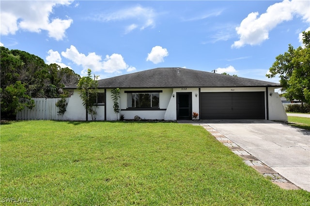 single story home with a garage and a front yard