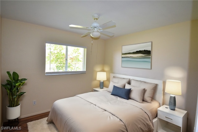 bedroom featuring hardwood / wood-style flooring and ceiling fan