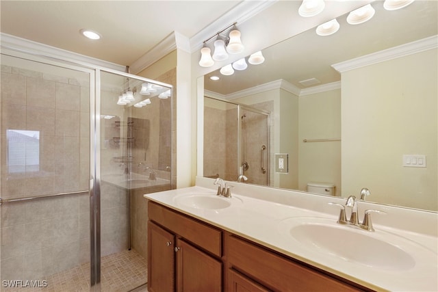 bathroom featuring toilet, a shower with shower door, and ornamental molding