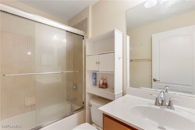 full bathroom featuring vanity, toilet, and enclosed tub / shower combo