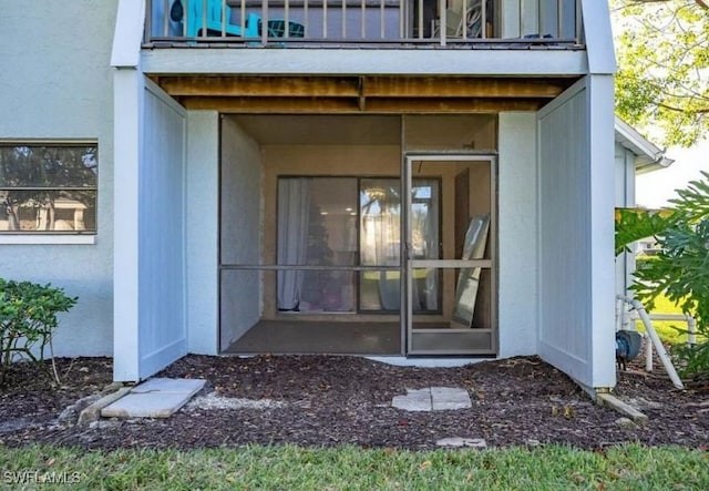 doorway to property with a balcony