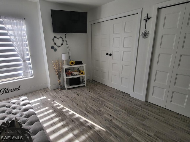 450 S Gulfview Blvd Unit 505, Clearwater, FL 33767 - bedroom with wood finished floors and a closet