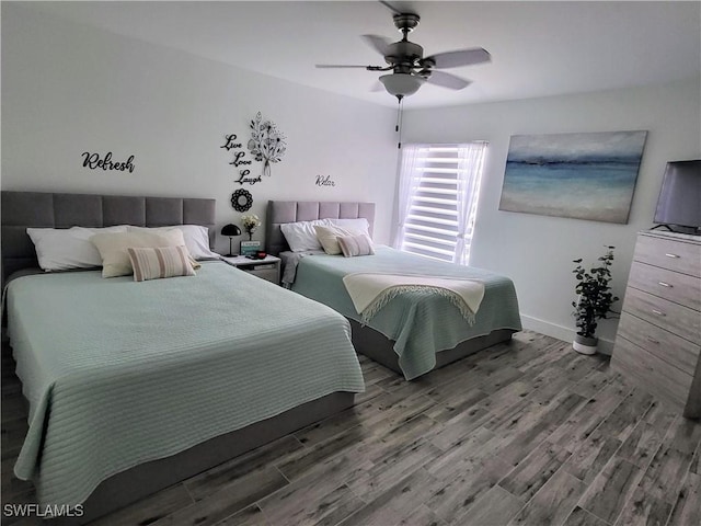 450 S Gulfview Blvd Unit 505, Clearwater, FL 33767 - bedroom with wood finished floors and a ceiling fan