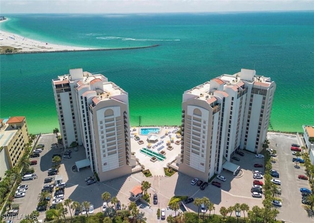 aerial view featuring a view of the beach and a water view