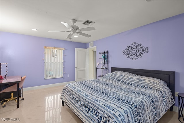 bedroom with ceiling fan and light tile patterned flooring