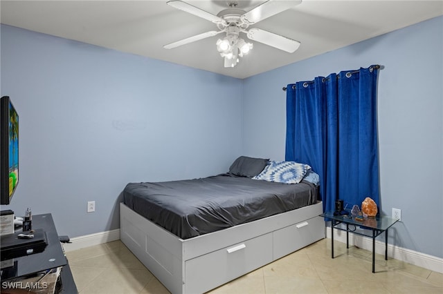 bedroom with light tile patterned flooring and ceiling fan