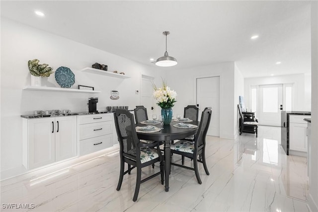 4930 Edith Esplanade, Cape Coral, FL 33904 - dining room with light marble finish flooring and recessed lighting