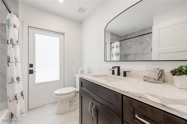 full bathroom with shower / bathtub combination with curtain, vanity, and toilet