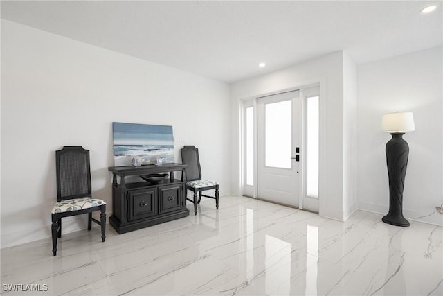 4930 Edith Esplanade, Cape Coral, FL 33904 - foyer with recessed lighting, marble tiled flooring, and baseboards
