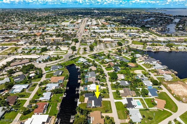 4930 Edith Esplanade, Cape Coral, FL 33904 - aerial view of property and surrounding area with a large body of water and nearby suburban area