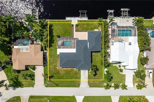 4930 Edith Esplanade, Cape Coral, FL 33904 - aerial view of property's location featuring property boundaries highlighted, a pool area, and a nearby body of water