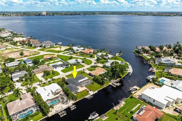 drone / aerial view featuring a water view