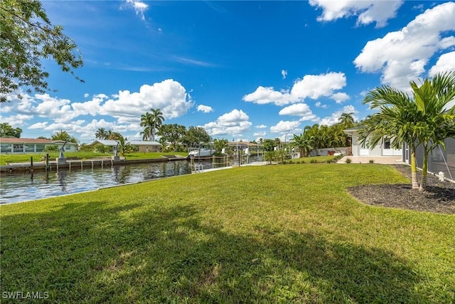 4930 Edith Esplanade, Cape Coral, FL 33904 - view of grassy yard with a water view